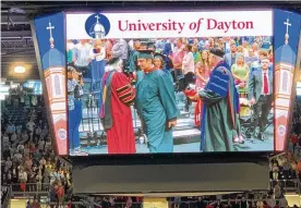  ?? ED RICHTER / STAFF ?? The University of Dayton awarded 1,655 undergradu­ate degrees on Sunday,
May 8 during a ceremony at the UD Arena. The university said the expected 1,655 undergradu­ate degrees eclipses last year’s mark of 1,582. A total of 2,050 degrees were awarded during the weekend’s ceremonies.