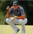  ?? GETTY IMAGES ?? Corey guns for glory: Conners lines up a putt