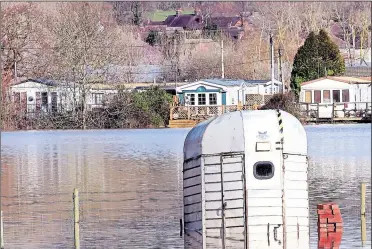  ??  ?? A submerged horse box as the main road into Yalding was left under water earlier this year