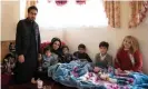  ??  ?? Sahar and family. She saved her fouryear-old daughter from gunmen who attacked them. Photograph: Farzana Wahidy/ The Guardian