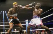  ?? ERIK VERDUZCO — LAS VEGAS REVIEW-JOURNAL VIA AP ?? Jarrett Hurd, left, fights Erislandy Lara in their middleweig­ht bout at the Hard Rock casino-hotel in Las Vegas, Saturday. Hurd won by split decision.