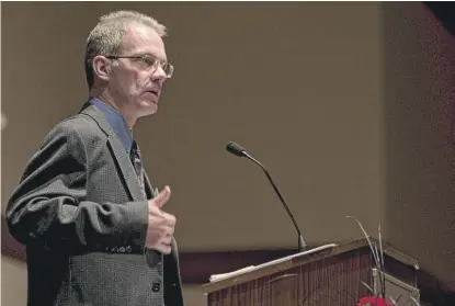  ?? SUN-TIMES FILE ?? Then-Illinois Poet Laureate Kevin Stein speaks at a 2004 event.