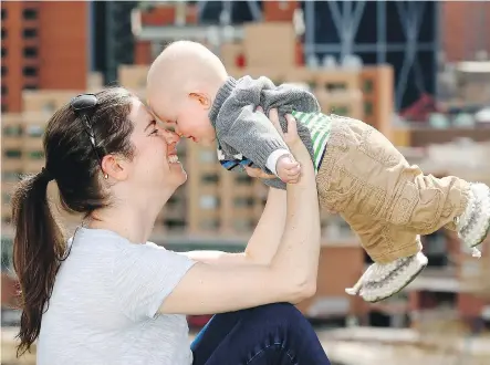  ?? DARREN MAKOWICHUK ?? Carolyn Davis’ five-month-old son, Alan Eremenko, is part of a baby boom that saw 18,984 births in Calgary counted in the 2016 census. The census found that nationwide, seniors outnumber those aged 14 and younger for the first time — though Calgary was an exception.