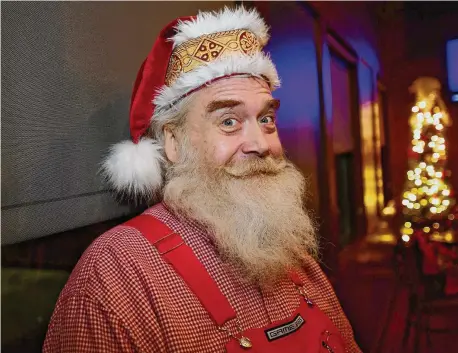  ?? ?? Santa Claus Jeff Gedney, of Trumbull, at the monthly Santa and Mrs. Claus gathering at the Wood-n-Tap restaurant in Southingto­n.