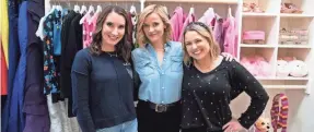  ?? JOHN SHEARER/NETFLIX ?? For the premiere episode of Netflix’s “Get Organized with The Home Edit,” Clea Shearer, left, and Joanna Teplin, right, organize a closet for actress Reese Witherspoo­n.