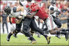  ?? BRANT SANDERLIN / BSANDERLIN@AJC.COM ?? After a sophomore season without a sack, Georgia linebacker Lorenzo Carter finished with 4½ sacks this year.