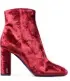  ??  ?? “Penggunaan bahan velvet berwarna merah membuat sepatu ankle boots ini terlihat lebih glamor dan mewah. Halusnya bahan velvet sudah menjadi favorit saya sejak kecil.” - Yolanda Deayu, Digital Reporter