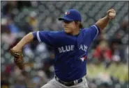  ?? PAUL SANCYA — THE ASSOCIATED PRESS FILE ?? Toronto Blue Jays pitcher Aaron Loup throws during a game against the Detroit Tigers a few seasons ago. The Phillies got the left-handed Loup from the Jays in exchange for minor league right-hander Jacob Waguespack Tuesday.