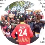  ?? ?? Zimbabwe’s Sikandar Raza(front) celebrates with supporters in Bulawayo, Zimbabwe, on July 17, 2022.
