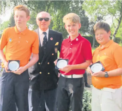  ??  ?? ●●Bramall Park team of Nathan Hopley, Alex Wilcock and Lewis Welsh receive their runners up trophies from Chris Moore at the Cheshire Junior Team championsh­ips