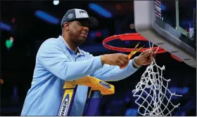  ?? (AP/Chris Szagola) ?? North Carolina Coach Hubert Davis is one of only two people to play and coach in the Final Four with the same school. The only other person to do so was Dick Harp, who played (1940) and coached (1957) NCAA runner-up teams with Kansas.