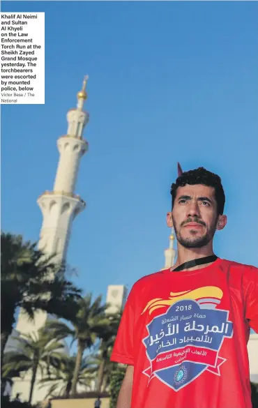  ?? Victor Besa / The National ?? Khalif Al Neimi and Sultan Al Khyeli on the Law Enforcemen­t Torch Run at the Sheikh Zayed Grand Mosque yesterday. The torchbeare­rs were escorted by mounted police, below