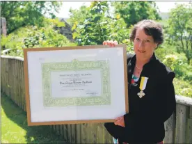  ?? Photograph: Anthony ?? Lillian MacDonald with her certificat­e for the Benemerent­i Medal which is an honour awarded by the Pope. MacMillan.