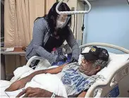  ?? COURTESY OF THE MEMPHIS VA ?? U.S. Marine Corps veteran Randy L. Johnson, Sr., who served in Vietnam, receives his first dose of the COVID-19 vaccine at the Memphis Veterans Affairs Medical Center on Dec. 22, 2020. Johnson was the first patient at the VA to receive the vaccine.