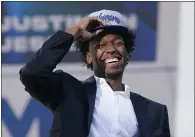  ?? JEFF CHIU — THE ASSOCIATED PRESS ?? Warriors draft pick James Wiseman laughs during a news conference in November.