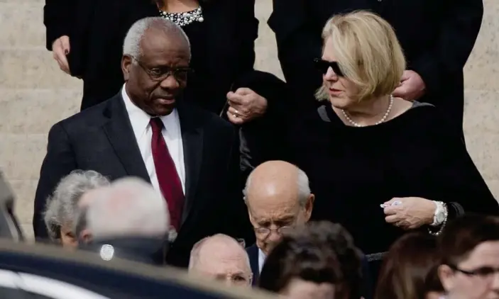  ?? Photograph: Pablo Martínez Monsiváis/AP ?? Justice Clarence Thomas, left, and his wife Virginia Thomas, right, are at the centre of ethical concerns surroundin­g the supreme court.