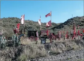  ??  ?? Gauchito Gil, a patriotic soldier who deserted the army in the 19th century, is said to protect drivers along the highways.