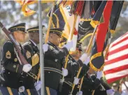  ?? John Storey / Special to the Chronicle 2018 ?? The color guard leads the parade at last year’s Memorial Day commemorat­ion at the Presidio.