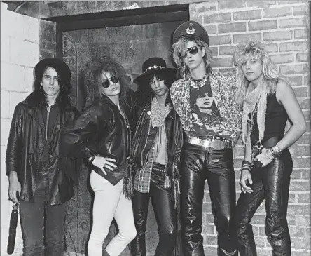  ?? Jack Lue Michael Ochs Archives/Getty Images ?? GNR gave gritty Hollywood a soundtrack. From left, original members Izzy Stradlin, Axl Rose, Slash, Duff McKagan, Steven Adler.