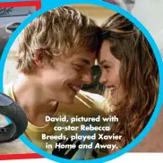  ??  ?? David, pictured with co-star Rebecca Breeds, played Xavier in Home and Away.
