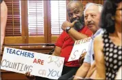  ?? M. GONZALEZ / AMERICAN-STATESMAN ?? Charles Runnels, a retired bus driver from Cypress, attends a press conference by the Texas AFT Retiree Committee at the Capitol on Thursday seeking reduced health care premiums.LYNDA