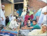  ?? RAVI CHOUDHARY/HT PHOTO ?? Junaid’s mother, Saira (centre), with other villagers in Khadwali, Haryana, on Friday.