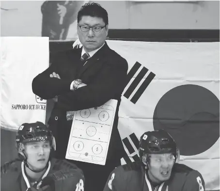  ??  ?? South Korea’s head coach Jim Paek watches his team’s men’s top division match against Kazakhstan at the Asian Winter Games in February in Japan. Paek, the first Korean-born player to play in the NHL, won Stanley Cups with Pittsburgh in 1991 and 1992.