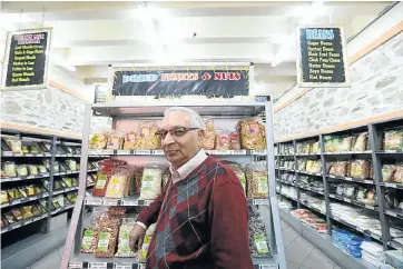  ??  ?? Abdul Wahab Ahmed is a third-generation South African and director of Atlas Trading, where everyone buys their spices.