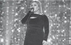  ?? ANDREW NELLES/TENNESSEAN.COM ?? Kelly Clarkson performs during the 57th Academy of Country Music Awards at Allegiant Stadium in Las Vegas, March 7, 2022.