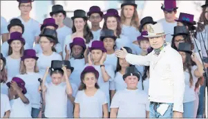  ?? CP PHOTO ?? Tragically Hip frontman Gord Downie acknowledg­es the youth choir that performed his song, “Secret Path” at We Day on Parliament Hill, in Ottawa on July 2. Downie’s project “Secret Path” tells the story of Chanie Wenjack, who died in 1966 escaping a...