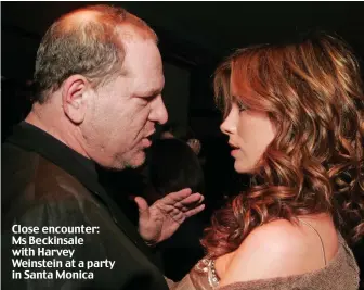  ??  ?? Close encounter: Ms Beckinsale with Harvey Weinstein at a party in Santa Monica