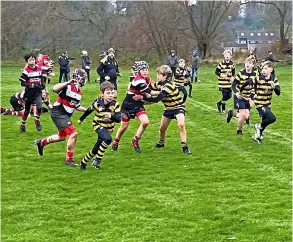  ?? ?? Keynsham RFC’S under-12s enjoyed a great morning hosting Frome (red, black and white) as two really well-matched and competitiv­e sides played lots of good rugby