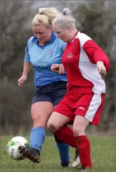  ??  ?? Nicola Davitt of North End United and Alma Morris of Bunclody A.F.C. battling for possession in their Wexford Women’s Cup quarter-final match in Drinagh recently.