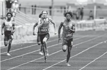  ?? SILAS WALKER swalker@herald-leader.com ?? Lexington Catholic’s Kaylib Nelson won the 100- and 200-meter dashes at the Class 2A Region 6 track and field meet at Henry Clay High School on Saturday.