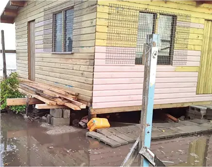  ?? Photo: Kelepi Saukitoga ?? Homes have been affected by the impacts of climate change in Narikoso Village, Kadavu.