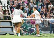  ?? JOHN WALTON/AP ?? Serena Williams greets Harmony Tan at the net after losing to her in a first-round singles match at the Wimbledon tennis championsh­ips Tuesday in London.