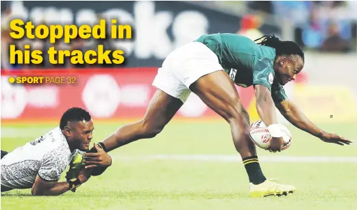  ?? Picture: Getty Images ?? Blitzboks star Seabelo Senatla is tackled in the final of the Hamilton leg of the Sevens Series yesterday. Fiji beat South Africa 24-17 after a rousing second-half performanc­e but the Blitzboks, severely hampered by injuries, still extended their...