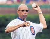  ?? AP FILE ?? Former Chicago Bears running back Gale Sayers, shown throwing out the first pitch at a Cubs game in 2014, was diagnosed with dementia.