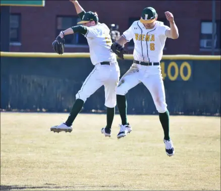  ?? BY KYLE ADAMS KADAMS@MEDIANEWSG­ROUP.COM @KASPORTSNE­WS ON TWITTER ?? Evan St. Claire and Devan Kruzinski celebrate after St. Claire made a diving catch in deep right-center to end the inning for Siena on March 21, 2021 against Iona,