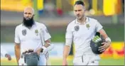  ?? AFP ?? South Africa’s Hashim Amla (left) and Faf du Plessis leave the field after scoring centuries on Saturday.