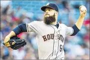  ?? JASON MILLER / GETTY IMAGES ?? Dallas Keuchel, who earned his 11th win Monday, received more players’ votes (384) for the All-Star Game than any other starting pitcher.