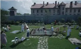  ?? Photograph: Courtesy of A24 ?? The Höss family in their lovingly tended garden nextdoor to Auschwitz in The Zone of Interest.