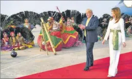  ?? AFP ?? Traditiona­l performers greet the US President Donald Trump and First Lady Melania Trump in Agra.
■