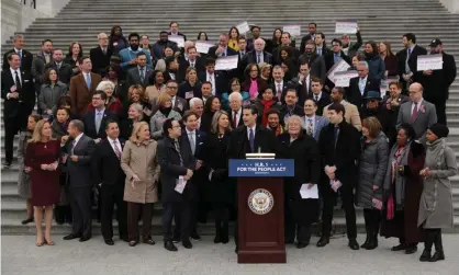  ??  ?? Democrats speak to the media before voting on HR 1 on Friday. Photograph: Chip Somodevill­a/Getty Images