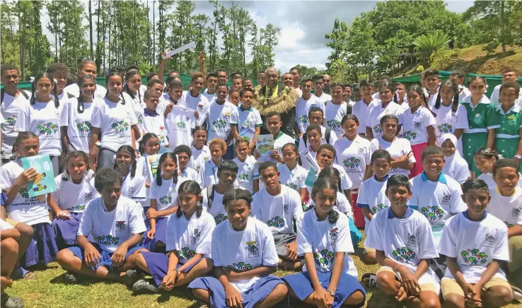  ?? Photo: Shratika Naidu ?? Minister for Forestry Kalaveti Ravu (wearing garland) with participan­ts during at the launch of climate smart agricultur­e at Korotari Forestry Station, Labasa, on March 21, 2023.