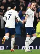  ?? Photograph: Sebastian Frej/MB Media/Getty ?? Son Heung-min celebrates with Harry Kane after scoring the equaliser against Manchester United, set up by Kane.