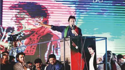  ?? AFP ?? Pakistani cricketer-turned-opposition leader and head of the Pakistan Tehreek-i-Insaf (PTI) Imran Khan addresses his supporters during an anti-government rally in Islamabad on Friday.