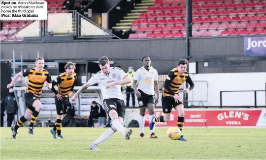  ?? Pics: Alan Graham ?? Spot on Aaron Muirhead makes no mistake to slam home the third goal