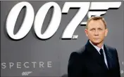  ?? ASSOCIATED PRESS ?? BRITISH ACTOR DANIEL CRAIG announced he is returning to cars, cocktails and camera pens to play James Bond in the franchise’s next film, due out in 2019.