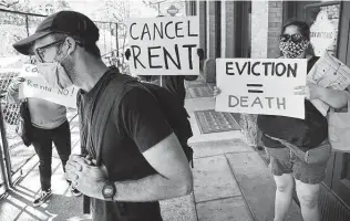  ?? Staff file photo ?? Justin Cornett, representi­ng Tenants Union of San Antonio, leads a protest in 2020. The federal government wants local entities to return rent relief money that they have been slow to allocate.